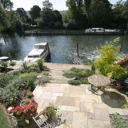 Riverside garden with sun terrace